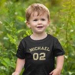 Toddler Boy Girl Name Jersey Number Sports Cotton Toddler T-Shirt<br><div class="desc">Create your own custom, personalised, cool, unisex sizing, modern, stylish faux gold typography / font / script, monogrammed player name jersey number classy black, 100% combed ring spun fine jersey soft cotton t-shirt tee shirt. Simply type in your name / kids name / player name and player jersey number, to...</div>