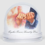 Together Forever Bound by Love Timeless Gift Snowglobe<br><div class="desc">Celebrate everlasting love with this beautifully artistic snow globe featuring two intertwined golden wedding bands resting on a watercolor plate with soft pastel tones. A timeless keepsake for weddings, anniversaries, or engagements, this elegant dome design adds a romantic touch to any décor. Customise it with names, a date, or a...</div>