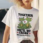 Together Until We Croak Funny Frog Couple Custom T-Shirt<br><div class="desc">Celebrate your unbreakable bond with this adorable frog couple design! Featuring two charming frogs surrounded by hearts and flowers, this whimsical shirt is perfect for couples who love humour and a unique way to express their commitment. Personalise it with your names to make it truly special. Ideal for anniversaries, Valentine’s...</div>