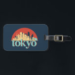 Tokyo Japan City Skyline Retro Travel Art Luggage Tag<br><div class="desc">Vintage and retro city design with beautiful skyline, tourist attraction and cityscape art. Cool skyscraper and building silhouette illustration merchandise for tourist and traveller. Perfect as souvenir to bring back home when travelling. Save the memory of your travel and vacation with family and friends. Background colour can be customised to...</div>