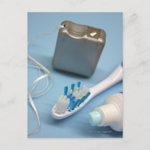 Toothbrush, toothpaste and floss. postcard