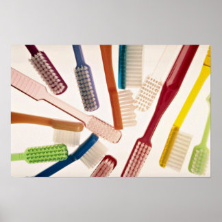Toothbrushes in different colours and shapes poster