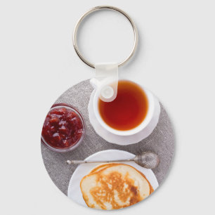 Top view of a plate of hot pancakes with vintage key ring