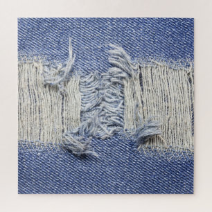 Torn blue denim: jeans texture. jigsaw puzzle