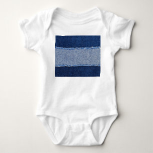 Torn denim: blue jeans fabric. baby bodysuit