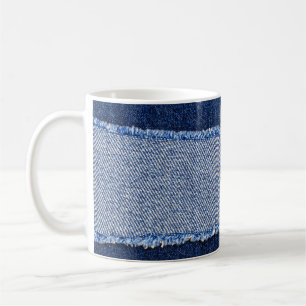 Torn denim: blue jeans fabric. coffee mug