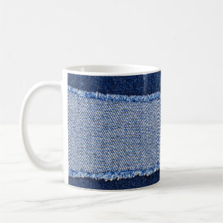 Torn denim: blue jeans fabric. coffee mug