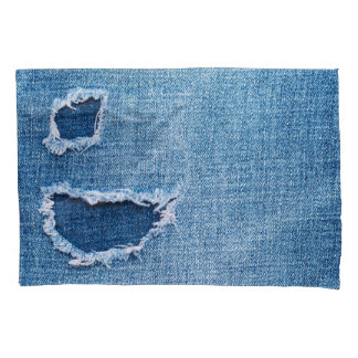 Torn denim fabric texture, blue hues. pillowcase