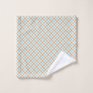 Towel set with a blue and orange geometric diamond