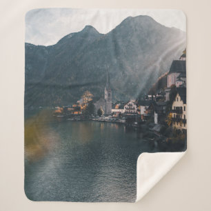 TOWN BESIDE BODY OF WATER AND MOUNTAINS SHERPA BLANKET