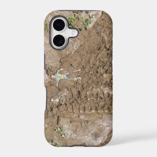 Toy man pushed into mud.