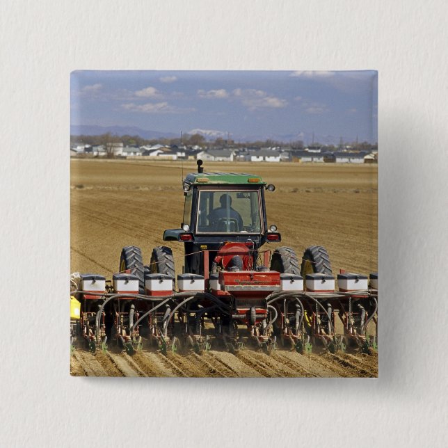 Tractor pulling a seed corn planter. 15 cm square badge (Front)