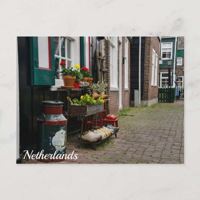 Traditional dutch wooden shoes on street postcard (Front)