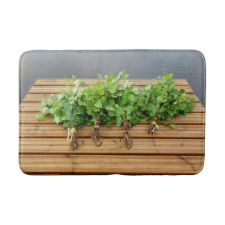 Traditional Finnish bath whisks on a jetty Bath Mat