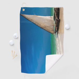 Traditional fishing boat on the beach golf towel