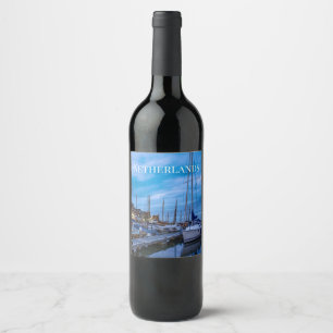 Traditional fishing town night scene wine label