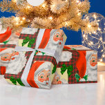 Traditional Old-Fashioned Vintage Santa Christmas Wrapping Paper<br><div class="desc">A lovely old-fashioned Christmas wrapping paper with a traditional holiday design featuring a jolly,  red-faced vintage Santa Claus. He's wearing a red Santa hat and has a full,  bushy white beard. Behind him is a red and black tartan (or plaid) pattern and green velvet gift bows and holly.</div>