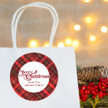 Traditional Red Plaid Tartan Merry Christmas Party Classic Round Sticker<br><div class="desc">A classic red plaid tartan pattern behind your Merry Christmas message with your personalised family name on gift stickers. A festive,  traditional holiday present sticker.</div>