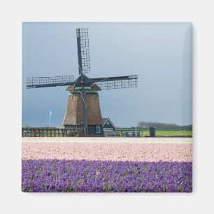 Traditional windmill with pink and purple flowers magnet