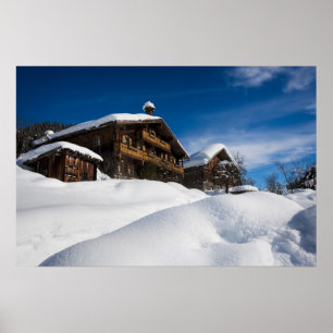 Traditional wooden cabins in de snow poster