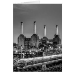 Trains pass Battersea Power Station, London