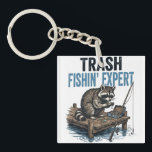 Trash Fishin' Expert Raccoon Key Ring<br><div class="desc">Are you a fan of raccoons and fishing? This funny 'Trash Fishin' Expert' design features a master raccoon angler on a wooden dock with his gear. Perfect for anyone who loves trash panda memes, outdoor fishing trips, and a good laugh. This vintage-style illustration is a great gift for fishers, outdoorsmen,...</div>