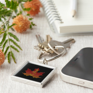 Treble Clef Overlaying Red Maple Leaf Key Ring