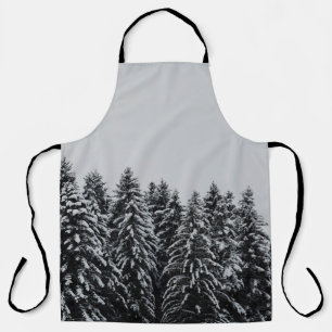 TREE COVERED SNOW UNDER CLOUDY SKY APRON