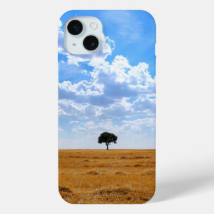Tree in an harvested wheat field  iPhone 15 mini case