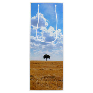 Tree in an harvested wheat field wine gift bag