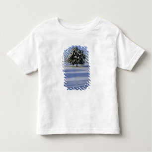 Tree in snow covered landscape toddler T-Shirt