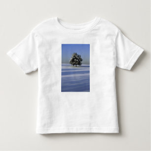 Tree in snow covered landscape toddler T-Shirt