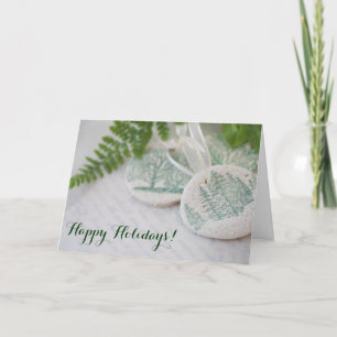 Tree ornaments on old handwriting holiday card