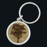 Tree Silhouette on Bronze Background Key Ring<br><div class="desc">A bronze background serves as the scene for this silhouette of a tree with branches swaying in the breeze. You almost feel as if you could rest your back against this tree,  sit on the ground and take a long nap.</div>