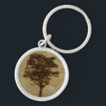 Tree Silhouette on Bronze Background Key Ring<br><div class="desc">A bronze background serves as the scene for this silhouette of a tree with branches swaying in the breeze. You almost feel as if you could rest your back against this tree,  sit on the ground and take a long nap.</div>