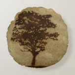 Tree Silhouette on Bronze Background Round Cushion<br><div class="desc">A bronze background serves as the scene for this silhouette of a tree with branches swaying in the breeze. You almost feel as if you could rest your back against this tree,  sit on the ground and take a long nap.</div>