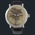 Tree Silhouette on Bronze Background Watch<br><div class="desc">A bronze background serves as the scene for this silhouette of a tree with branches swaying in the breeze. You almost feel as if you could rest your back against this tree,  sit on the ground and take a long nap.</div>