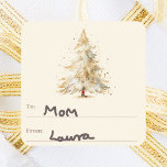 Tree snow cream to from Christmas Square Sticker<br><div class="desc">A cream coloured background,  and a watercolored hand-drawn pine tree with snow  A to/from tag.  space for you to write by hand.  Text in mocha,  muted brown.</div>