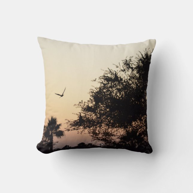 trees and flying bird against florida sunset cushion (Front)