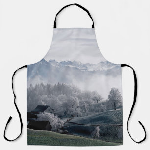 TREES BESIDE SNOW CAPPED MOUNTAIN DURING DAYTIME APRON