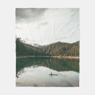 TREES NEAR BODY OF WATER DURING DAYTIME FLEECE BLANKET