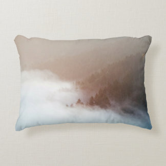 Trees on mountain covered with fogs decorative cushion