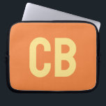 Trend Colour Fresh Tangerine Laptop Sleeve<br><div class="desc">Introducing the trendy spring colour: Fresh Tangerine. Modern and stylish Laptop Sleeve with customisable monogram in a minimalist light yellow font. Its simple and clean design in a solid colour offers a timeless and classic appeal. Explore our spring trend colours for more products in the same colour or discover other...</div>