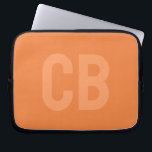 Trend Colour Fresh Tangerine Laptop Sleeve<br><div class="desc">Introducing the trendy spring colour: Fresh Tangerine. Modern and stylish Laptop Sleeve with customisable monogram in a minimalist light orange font. Its simple and clean design in a solid colour offers a timeless and classic appeal. Explore our spring trend colours for more products in the same colour or discover other...</div>