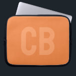 Trend Colour Fresh Tangerine Laptop Sleeve<br><div class="desc">Introducing the trendy spring colour: Fresh Tangerine. Modern and stylish Laptop Sleeve with customisable monogram in a minimalist light orange font. Its simple and clean design in a solid colour offers a timeless and classic appeal. Explore our spring trend colours for more products in the same colour or discover other...</div>