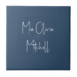 Trend Colour Serious Blue Name Ceramic Tile<br><div class="desc">Introducing the trendy spring shade: Serious Dark Blue. Elevate your home decor with our modern and stylish ceramic tile, featuring a customisable name in a charming handwritten font in classic white, looking like a signature. Its elegant and minimalist design in solid colours exudes timeless appeal, making it perfect for personal...</div>