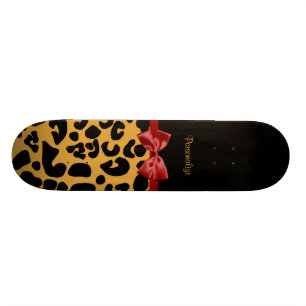Trendy Black and Gold Leopard Print Red Ribbon Bow Skateboard