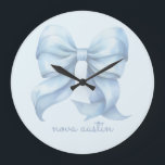 Trendy Blue Bow Personalised With Name Monogram Large Clock<br><div class="desc">Elevate your home or office decor with the Trendy Blue Bow Personalised With Name Monogram Large Clock, a perfect fusion of style and function. The clock’s preppy coquette bow, rendered in soft watercolor hues, brings a vintage girly aesthetic to any space. Whether you’re decorating a grandmillennial-themed room or adding a...</div>