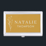 Trendy Boho Chic Minimalist Mustard Yellow Custom Business Card Holder<br><div class="desc">Our Trendy Boho Chic Minimalist Mustard Yellow Custom Business Card Case, the perfect accessory for the modern professional. Designed with elegance and sophistication in mind, this business card case features a chic mustard yellow exterior adorned with a delicate flower drawing. The minimalist design, complemented by trendy typography, ensures a sleek...</div>