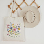 Trendy Colourful Wildflowers with Monogram Tote Bag<br><div class="desc">This stylish tote features a bouquet of pretty boho wildflowers,  in shades of blue,  purple,  pink,  and yellow with lovely green leaves. Add your monogram or initials at the bottom. The perfect wedding party gift or keepsake,  especially for your maid of honour or flower girl.</div>